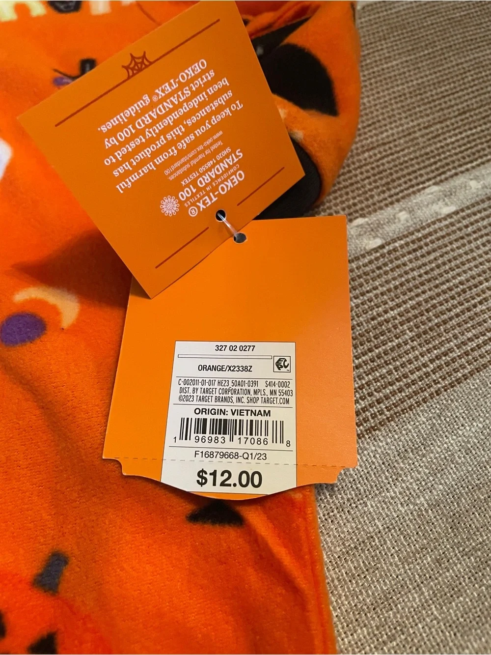 Orange Baby Sleepwear with Black Trim and Purple & White Ghosts